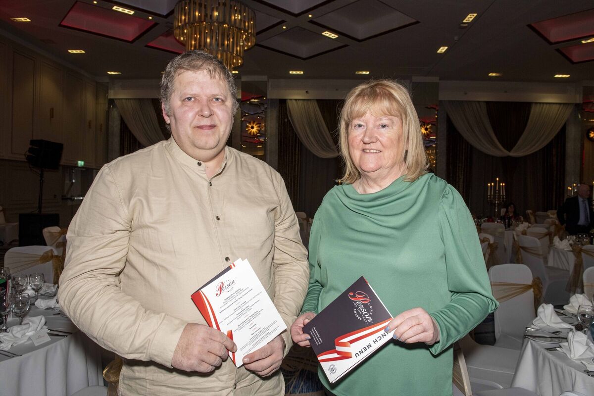 Caitriona Twomey, who with a group of volunteers provides thousands of free freshly-made meals to the needy every week, was presented with a Hall of Fame Award. Pictured here with Tomas Kalinauskas at the Cork Person of the Year awards. Picture: Brian Lougheed Caitriona Twomey, who with a group of volunteers provides thousands of free freshly-made meals to the needy every week, was presented with a Hall of Fame Award. Pictured here with Tomas Kalinauskas at the Cork Person of the Year awards. Picture: Brian Lougheed