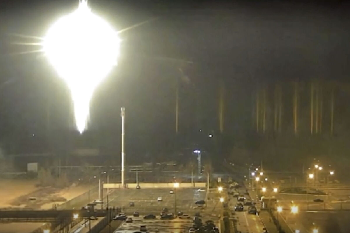 This image made from a video released by Zaporizhzhia nuclear power plant shows bright flaring object landing in grounds of the nuclear plant in Enerhodar, Ukraine Friday, March 4. (Zaporizhzhia nuclear power plant via AP) This image made from a video released by Zaporizhzhia nuclear power plant shows bright flaring object landing in grounds of the nuclear plant in Enerhodar, Ukraine Friday, March 4. (Zaporizhzhia nuclear power plant via AP)