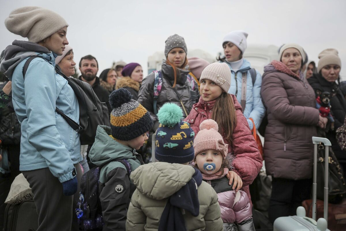 People fleeing Ukraine,wait in line to enter Poland through the border crossing Korczowa, Poland. More than 1 million people have fled Ukraine. (AP Photo/Visar Kryeziu) People fleeing Ukraine,wait in line to enter Poland through the border crossing Korczowa, Poland. More than 1 million people have fled Ukraine. (AP Photo/Visar Kryeziu)