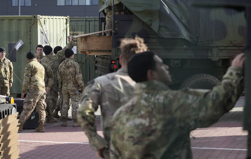US troops loading equipment onto vehicles in Rzeszow, last month as the country sent nearly 5,000 troops to its Nato ally, Poland, in addition to the 4,000 on permanent rotation in the country. Picture: Czarek Sokolowski/AP