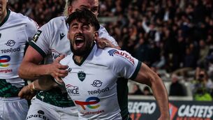 <p>
                <span class="contextmenu emphasis">HERO OF THE HOUR:</span> Pau's fly-half Antoine Hastoy celebrates after scoring the winning tray against Bordeaux at Chaban-Delmas stadium </p>