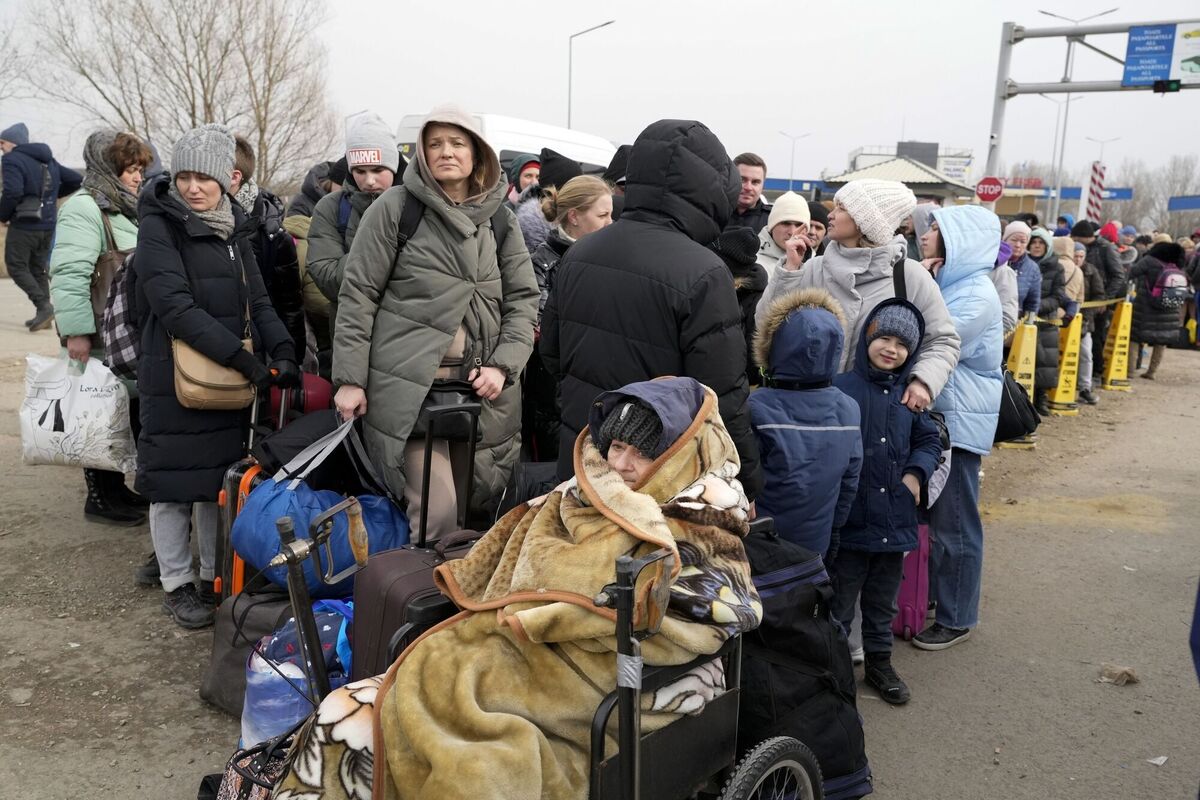 Refugees fleeing the war from neighbouring Ukraine arrive at the border crossing in Palanca, Moldova. Picture: AP Photo/Sergei Grits Refugees fleeing the war from neighbouring Ukraine arrive at the border crossing in Palanca, Moldova. Picture: AP Photo/Sergei Grits