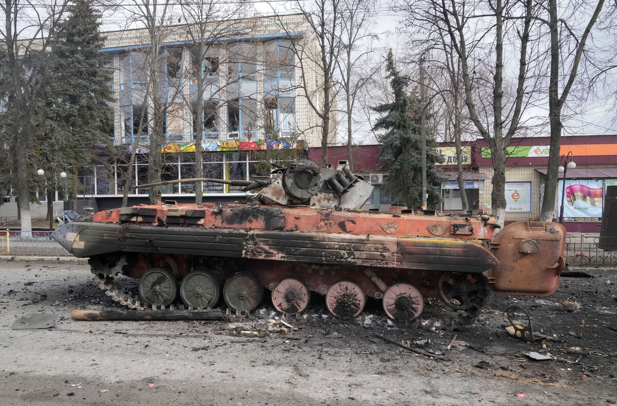 A destroyed armoured personnel carrier stands in the central square of the town of Makariv, 60km from Kyiv. Picture: AP A destroyed armoured personnel carrier stands in the central square of the town of Makariv, 60km from Kyiv. Picture: AP