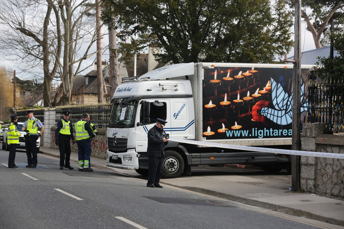 The truck is believed to have crashed through the gates of the embassy at about 1.30pm. Picture: Gareth Chaney/Collins Photos The truck is believed to have crashed through the gates of the embassy at about 1.30pm. Picture: Gareth Chaney/Collins Photos