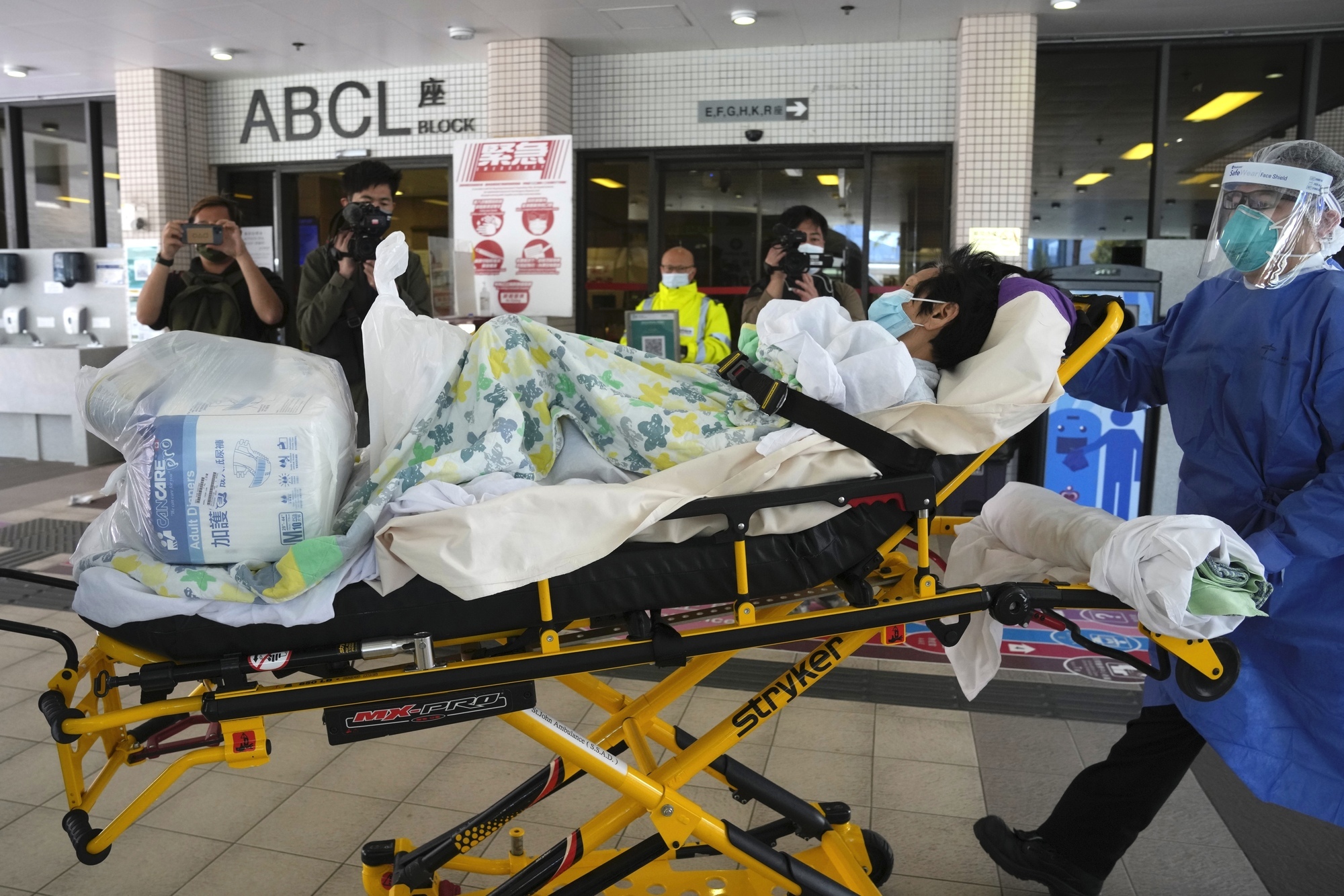 Hong Kong leader says no fixed timeframe for mass testing as Covid deaths soar
