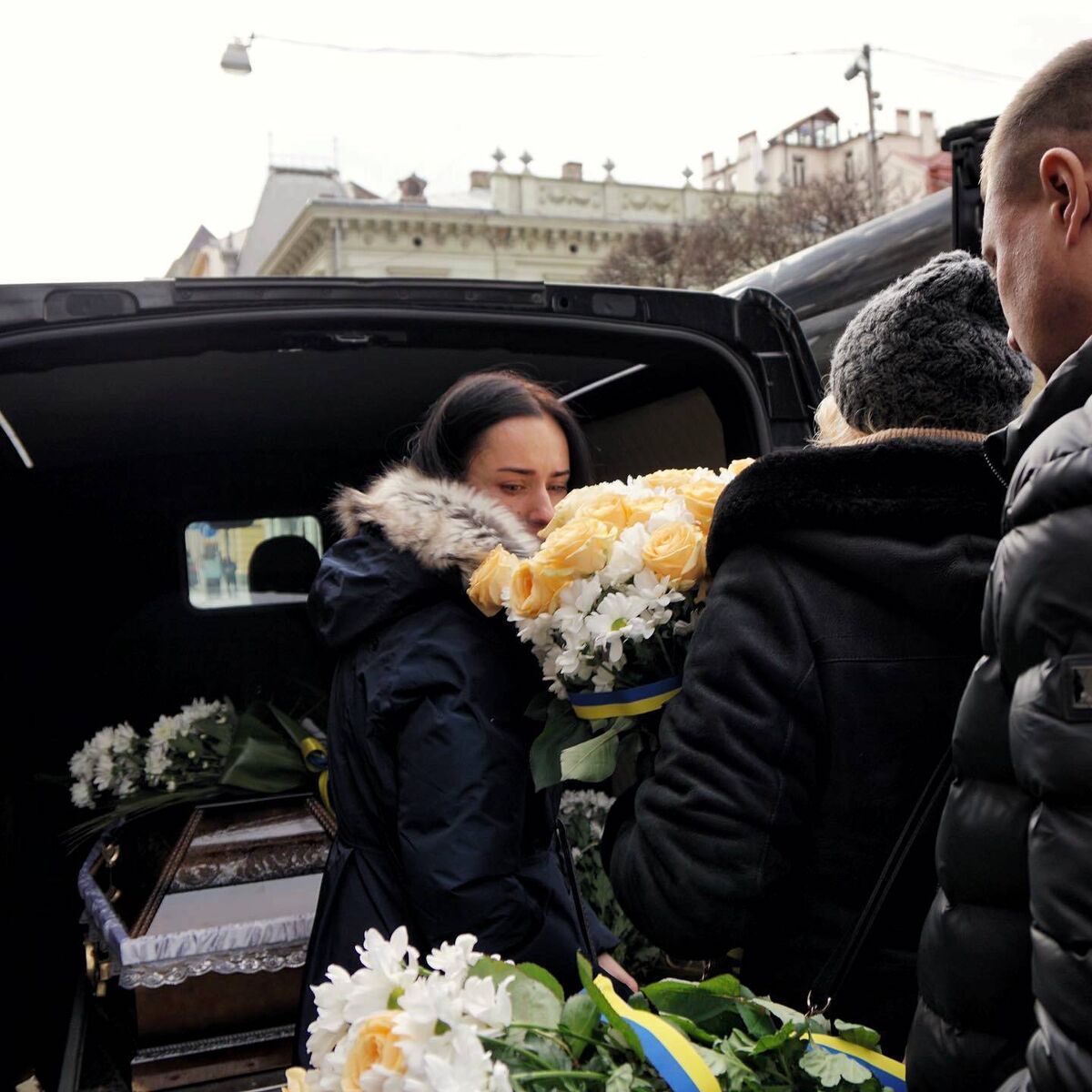 The funeral of a young Ukrainian soldier outside the Church of Peter and Paul in the old town of Lviv. Picture: Hannah McCarthy