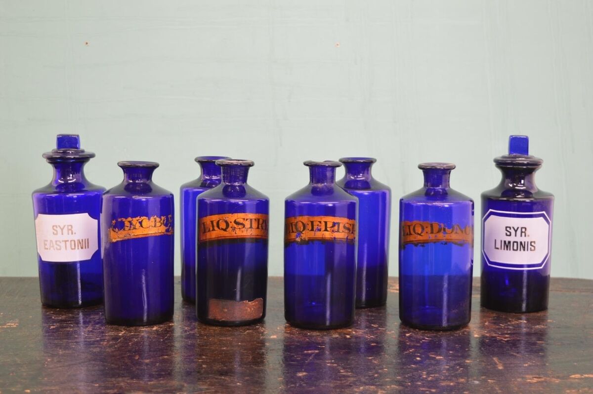A collection of eight Bristol blue chemist bottles. A collection of eight Bristol blue chemist bottles.