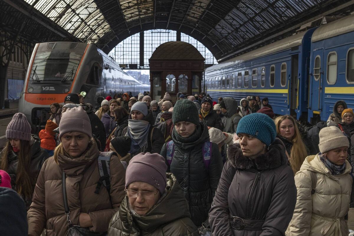 Passengers leave the railway station after disembarking from trains from the east on Friday. Photo: Dan Kitwood/Getty Images Passengers leave the railway station after disembarking from trains from the east on Friday. Photo: Dan Kitwood/Getty Images