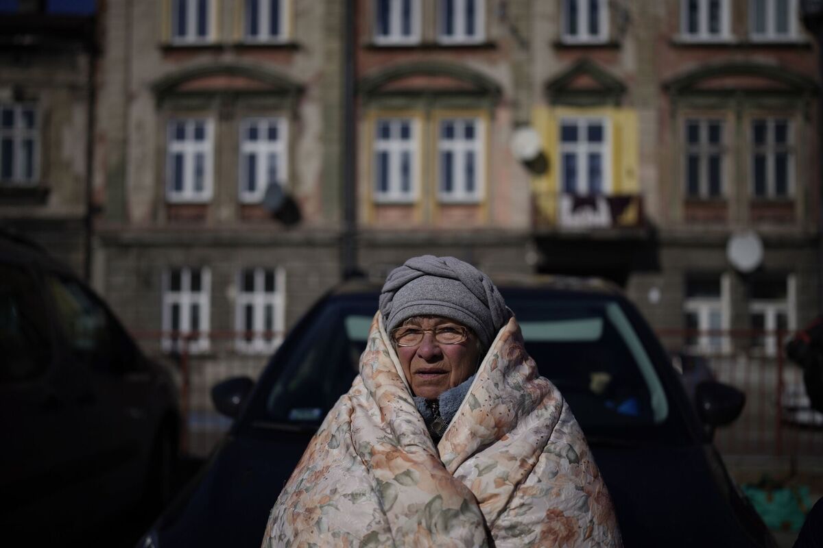 A Ukrainian woman waits at Przemysl train station on Friday. Photo: AP/Daniel Cole A Ukrainian woman waits at Przemysl train station on Friday. Photo: AP/Daniel Cole