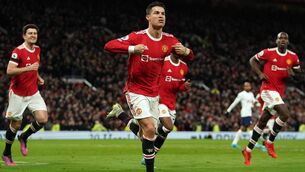 <p>Manchester United's Cristiano Ronaldo (centre) celebrates scoring his hat trick goal and his sides third goal of the game during the Premier League match at Old Trafford, Manchester. Picture: Martin Rickett/PA Wire. </p>