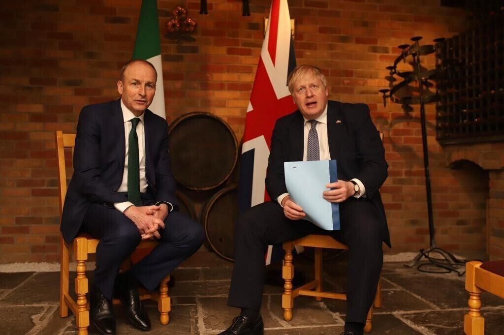 Taoiseach Micheal Martin speaking to Prime Minister Boris Johnson at Twickenham Stadium during his visit to the UK. Irish Government/PA Wire