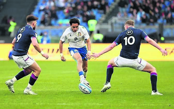 Italian debutant Ange Capuozzo gets the ball away in their clash with Scotland. He scored two tries on his debut to cheer Italy’s fans. Picture: Giuseppe Fama/Inpho