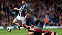 Baggies accept offer for Long, striker to decide on Hull move