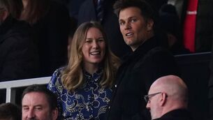 <p>Former American football quarterback Tom Brady (right) in the stands before the Premier League match at Old Trafford, Manchester. Picture Martin Rickett/PA Wire </p>
