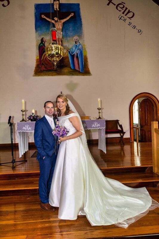 Mary Ellen Creedon and Noel Moynihan — the flower arrangements are by Alan Brady of Blooms, Killarney Mary Ellen Creedon and Noel Moynihan — the flower arrangements are by Alan Brady of Blooms, Killarney
