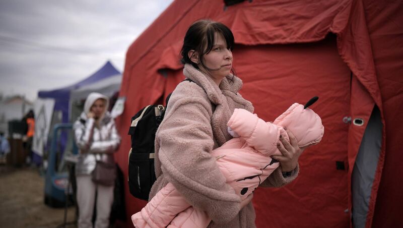 Refugees fleeing Ukraine arrive at the Vysne Nemecke border crossing in Vysne Nemecke, Slovakia. More than two million people have fled Ukraine into neighbouring countries since Russia launched a large-scale invasion of the country on February 24. Picture: Christopher Furlong/Getty Images