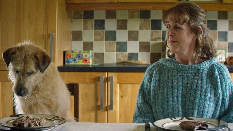 Bríd Ní Neachtain and the dog in Róise & Frank. Bríd Ní Neachtain and the dog in Róise & Frank.