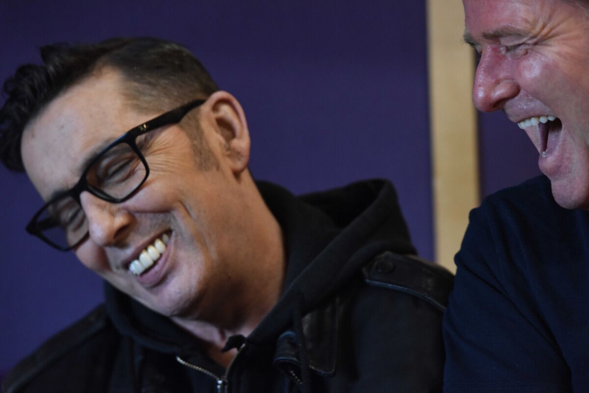 Aslan guitarist Billy McGuinness raises a big laugh from Christy Dignam during the band's pre tour rehearsals in Jealoustown Studios, Co Meath. Photograph Moya Nolan