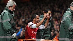 Walcott out for six months and World Cup