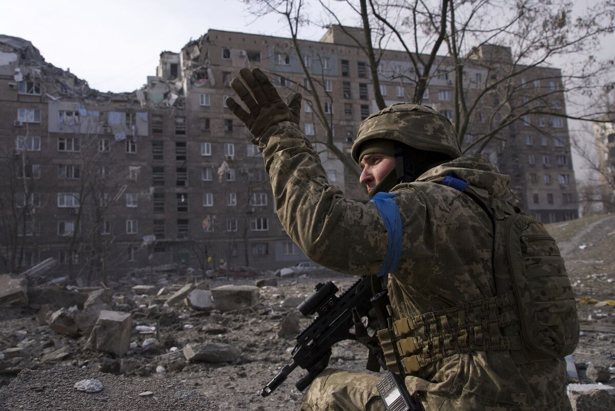 A Ukrainian serviceman guards his position in Mariupol, Ukraine, March 12, 2022. (AP Photo/Mstyslav Chernov)