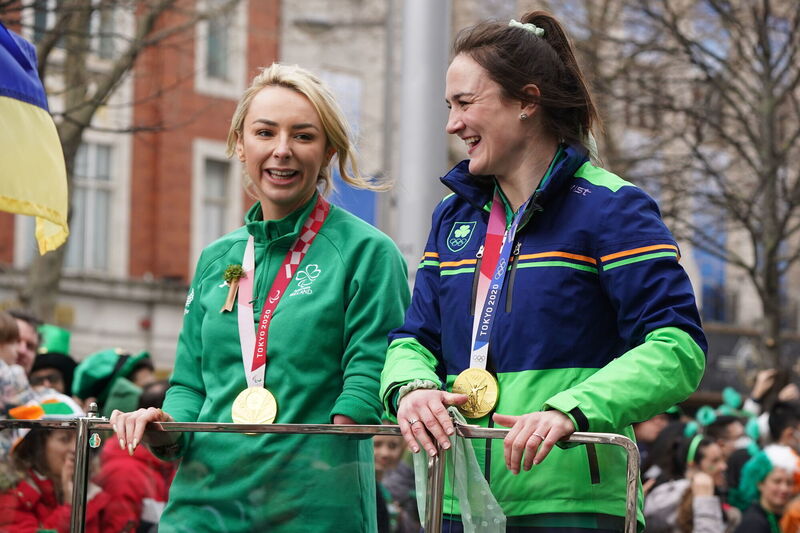 Grand Marshals for the Dublin parade - Paralympic gold medal swimmer Ellen Keane (left) and Olympic gold medal boxer Kellie Harrington. Picture: Brian Lawless/PA Wire Grand Marshals for the Dublin parade - Paralympic gold medal swimmer Ellen Keane (left) and Olympic gold medal boxer Kellie Harrington. Picture: Brian Lawless/PA Wire