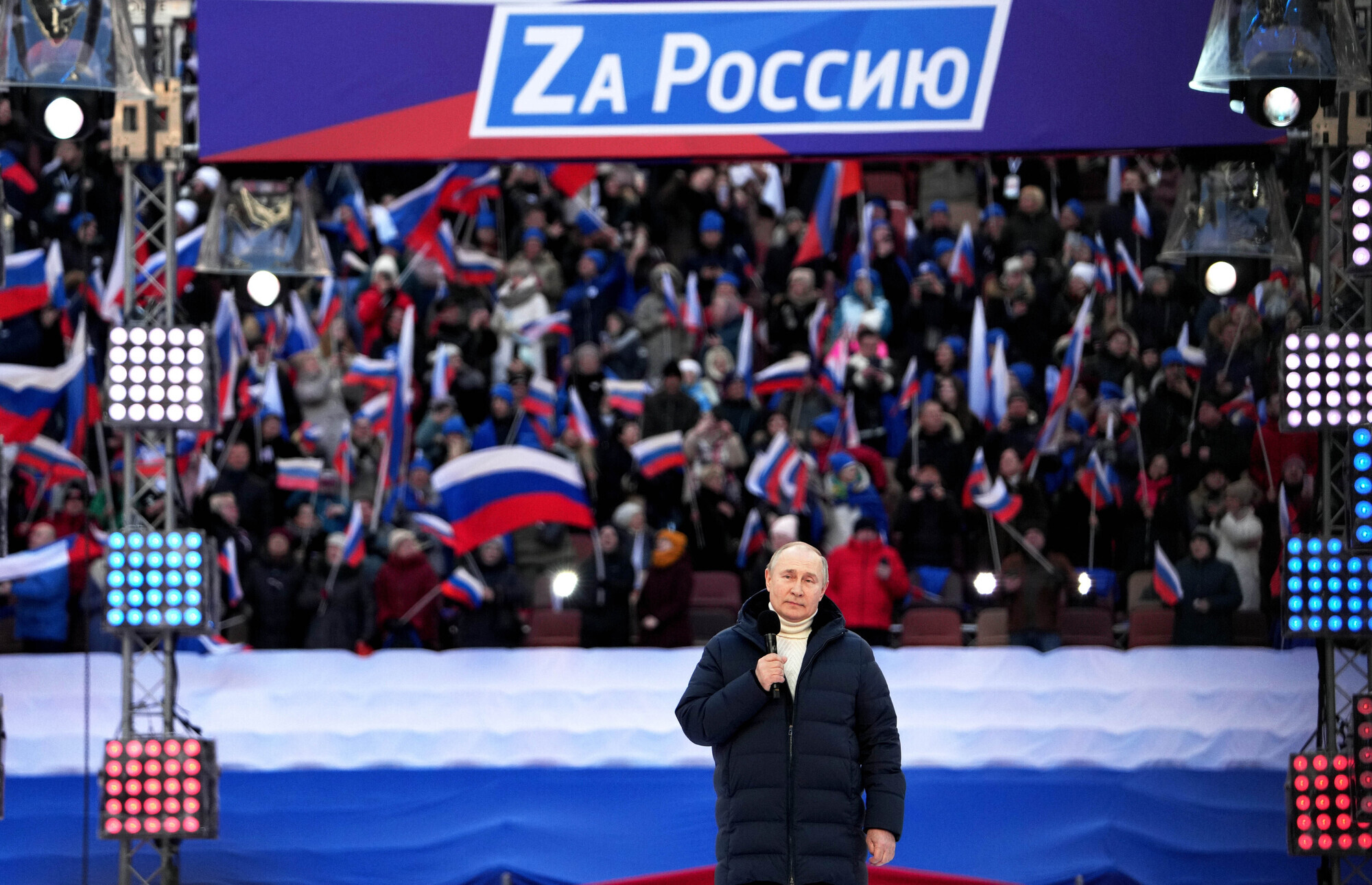 Vladimir Putin addresses rally in Moscow as Russian troops continue assault