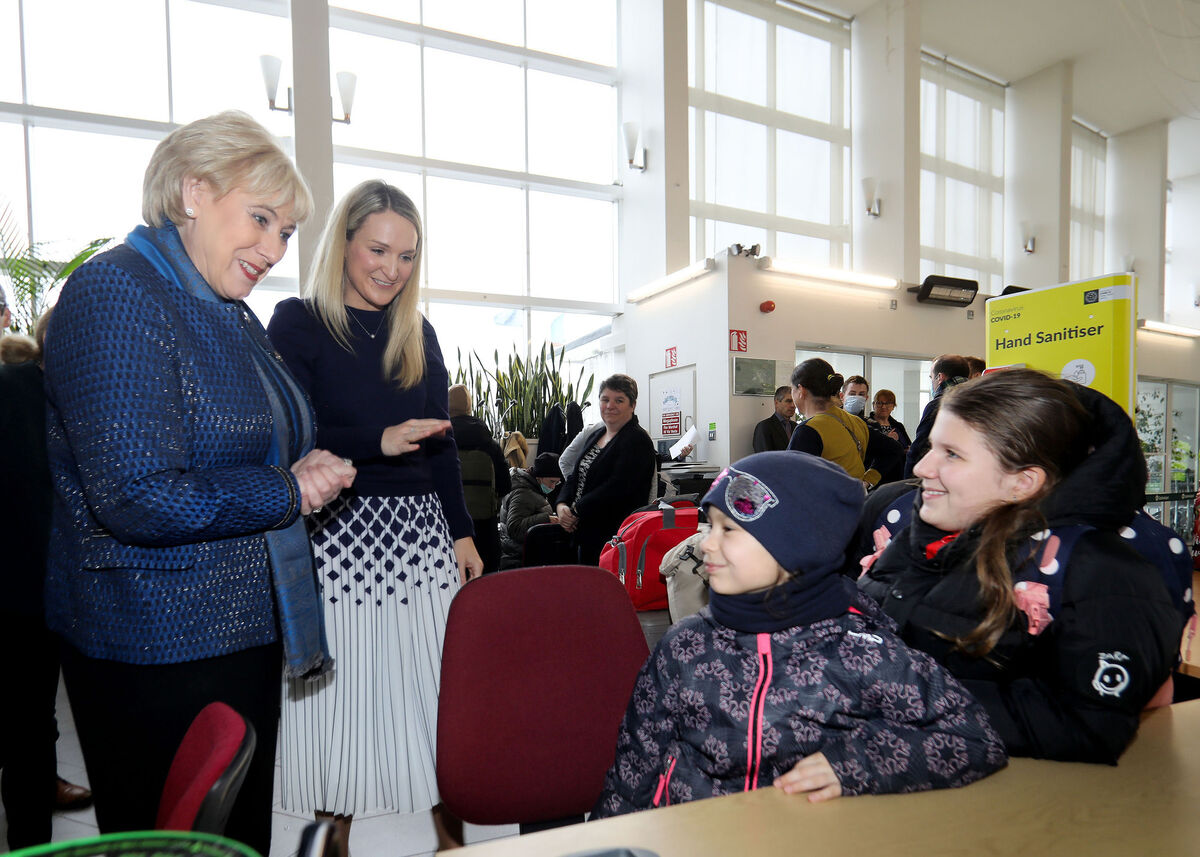 Ministers Heather Humphreys and Helen McEntee at Dublin Airport where they met with people arriving from Ukraine. Picture: Maxwells