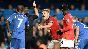 Vidic: United out of title race