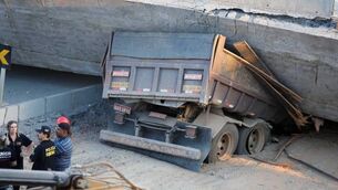 VIDEO: Brazil mourns after road collapses, killing two