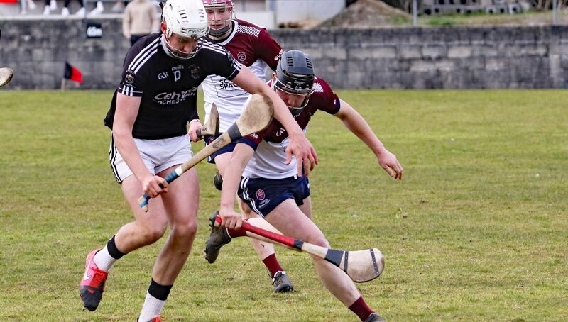 BURST: Mikey O'Connell, St Francis College Rochestown, clashing with Darragh Morrissey, Colaiste Bhaile Chlair, in the All Ireland Senior B Hurling Championship final in Meelick. BURST: Mikey O'Connell, St Francis College Rochestown, clashing with Darragh Morrissey, Colaiste Bhaile Chlair, in the All Ireland Senior B Hurling Championship final in Meelick.