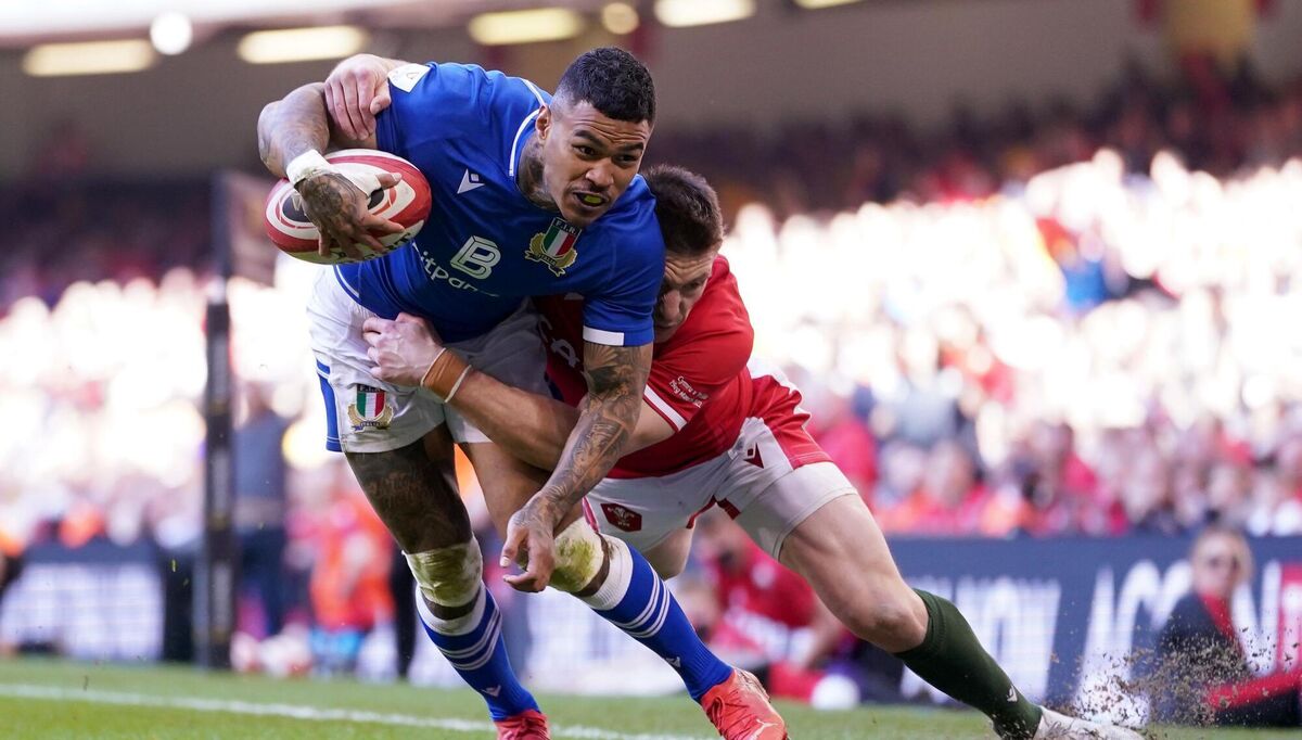 NEARLY; Italy's Monty Ioane is tackled into touch in the second half by Wales' Josh Adams at the Principality Stadium
