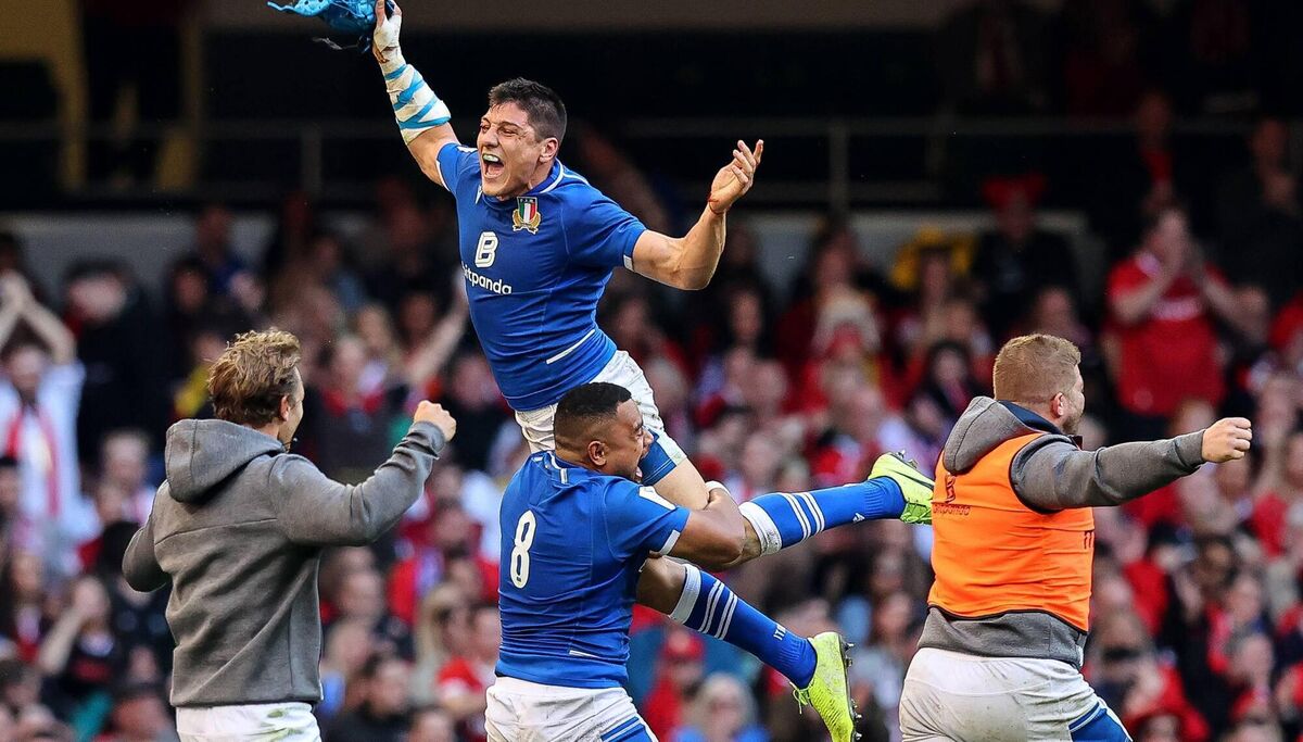 Italy’s Juan Ignacio Brex celebrates with Toa Halafihi after the game 