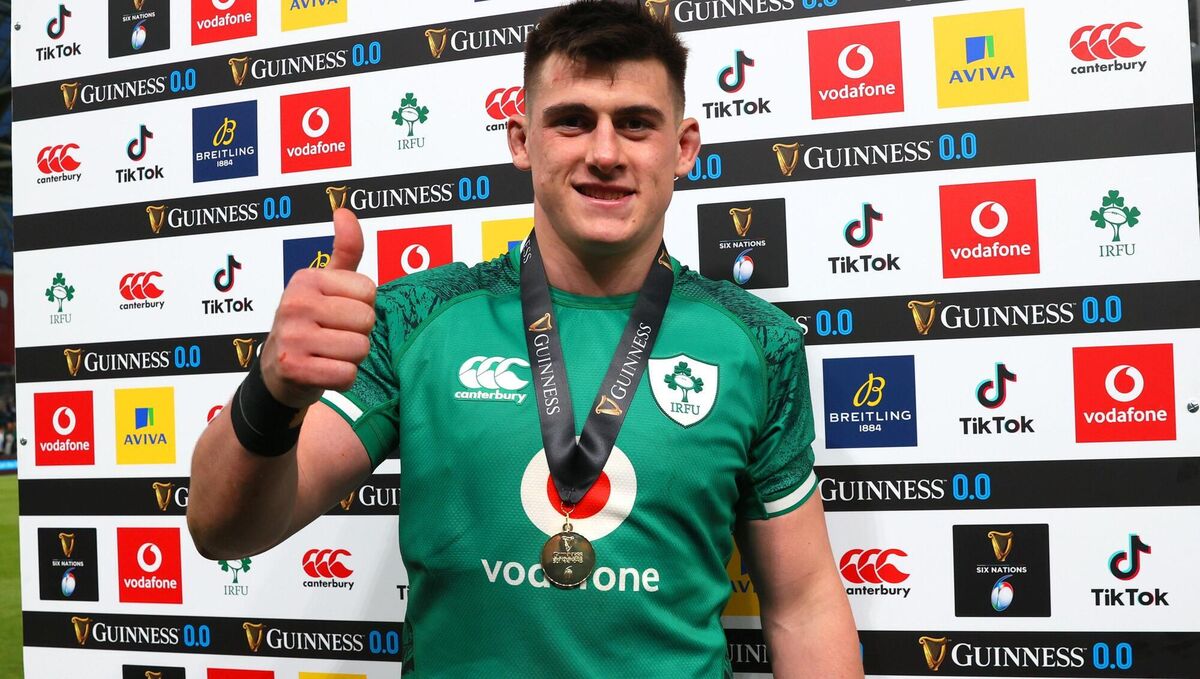Ireland's Dan Sheehan is presented with the Player of the Match award