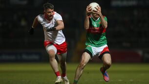 <p>Mayo’s Kevin McLoughlin and Tyrone’s Padraig Hampsey Picture:  ©INPHO/Lorcan Doherty</p>