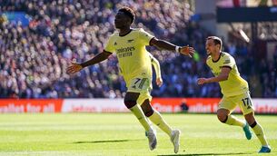 <p>Arsenal's Bukayo Saka celebrates scoring the decisive goal at Villa Park.</p>