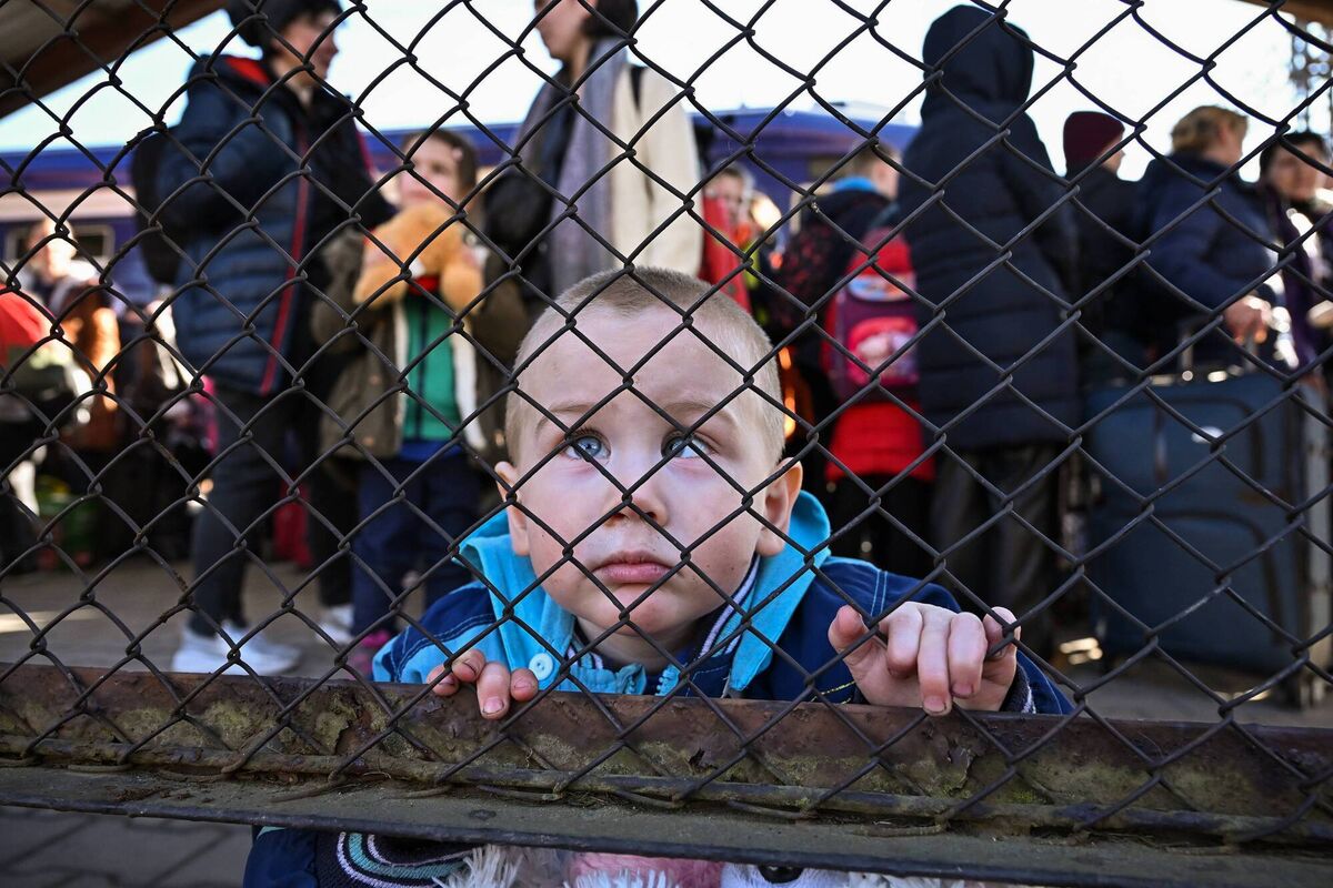 PRZEMYSL, POLAND - MARCH 22: A young boy arrives at Przemysl train station on a train from war-torn Ukraine on March 22, 2022 in Przemysl Poland. Picture: Jeff J Mitchell/Getty Images