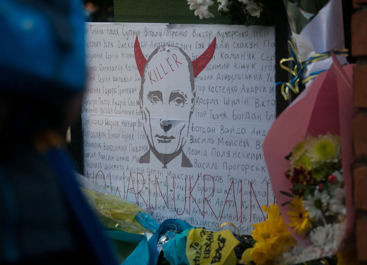 A poster of Vladimir Putin during a vigil at the Ukranian embassy in Ballsbridge, Dublin. Picture: Gareth Chaney/ Collins Photos