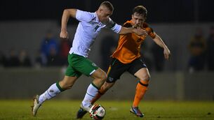 <p>Killian Phillips of Republic of Ireland U20's in action against AJ O'Connor of Republic of Ireland Amateur Selection during the friendly match between Republic of Ireland U20's and Republic of Ireland Amateur Selection at Home Farm FC in Dublin. Photo by Harry Murphy/Sportsfile</p>