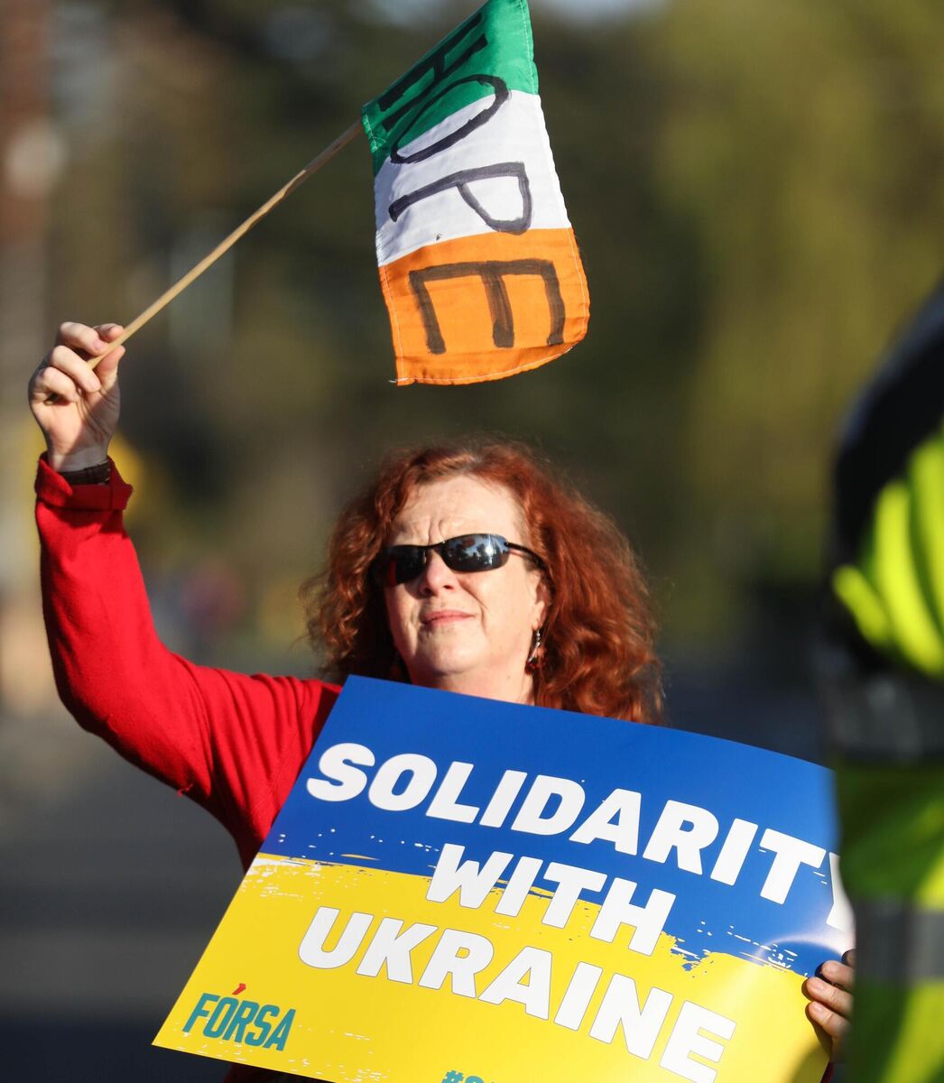 A woman with a Forsa poster outside the Russian embassy. Picture: Leah Farrell / RollingNews.ie A woman with a Forsa poster outside the Russian embassy. Picture: Leah Farrell / RollingNews.ie
