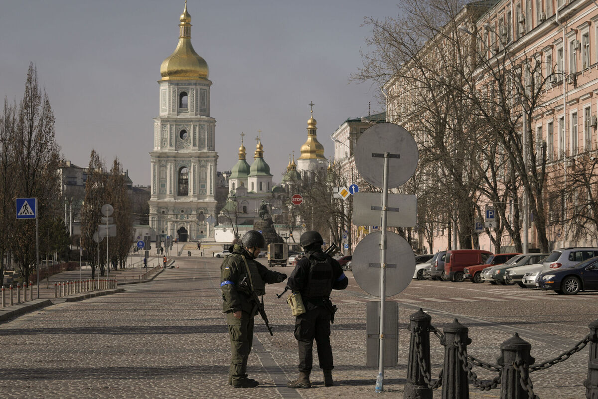 Ukrainian servicemen stand at a checkpoint in Kyiv, Ukraine. Picture: AP Photo/Vadim Ghirda