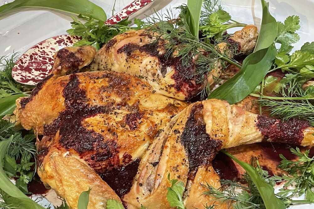 Spatchcock chicken with blackberries and grapes