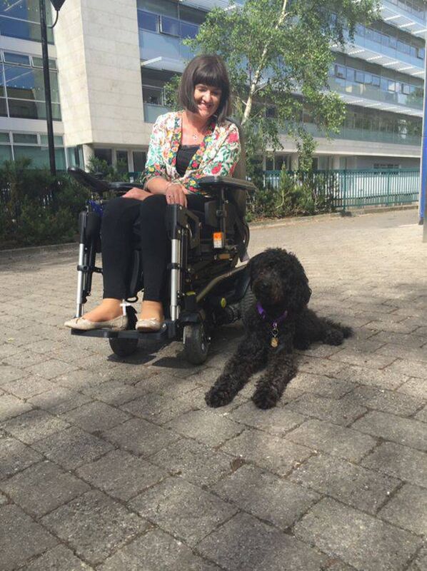 Aisling Glynn and her assistance dog Gina: 'There's a tendency for people to look at people with disabilities as a kind of ‘them and us’, but it’s really about all of us.'