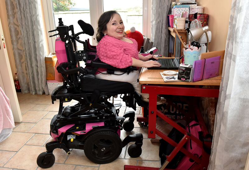 Elena Canty at her worktop at her home in Cork: 'When you're in a wheelchair, you view the world from a different lens.' Picture: Eddie O'Hare