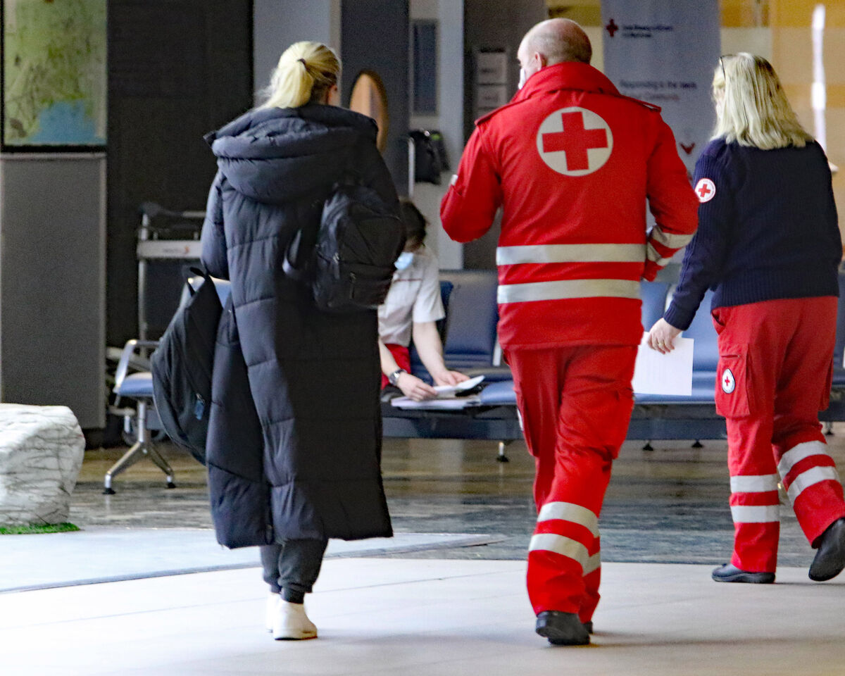 Aiden Lonergan, national director of community support, Irish Red Cross, welcoming Svitlana Vitske, Ukrainian Refugee into Shannon Airport. Picture: Brendan Gleeson