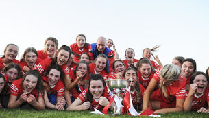 <p>Tesco All-Ireland Camogie Minor A Championship Final, FBD Semple Stadium, Thurles, Tipperary 26/3/2022 Cork vs Galway Cork players celebrate with the cup Mandatory Credit ©INPHO/Tommy Grealy</p>