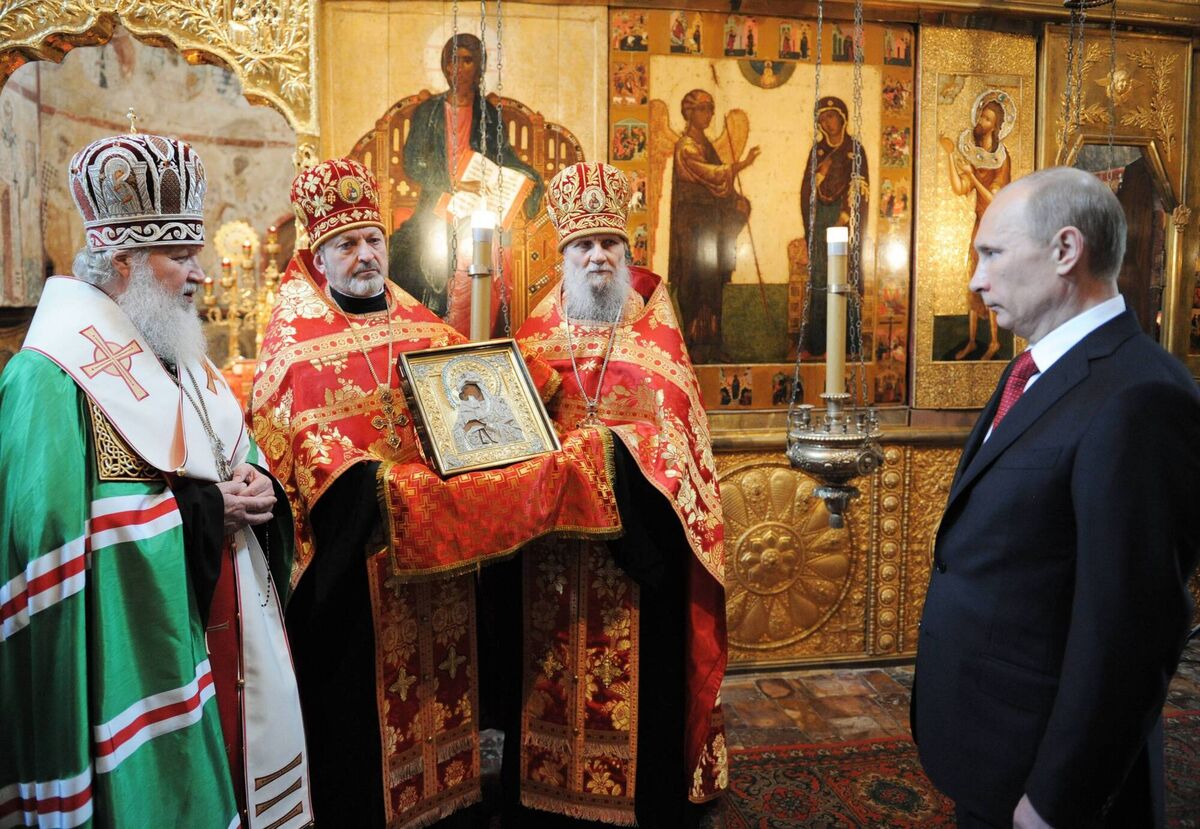 Russian Orthodox Church head, Patriarch Kirill (left) at a service with Vladimir Putin: Kirill supports Putin's view that  gender and sexual freedoms are seen as the main threat to Russia. Picture: GettyImages
