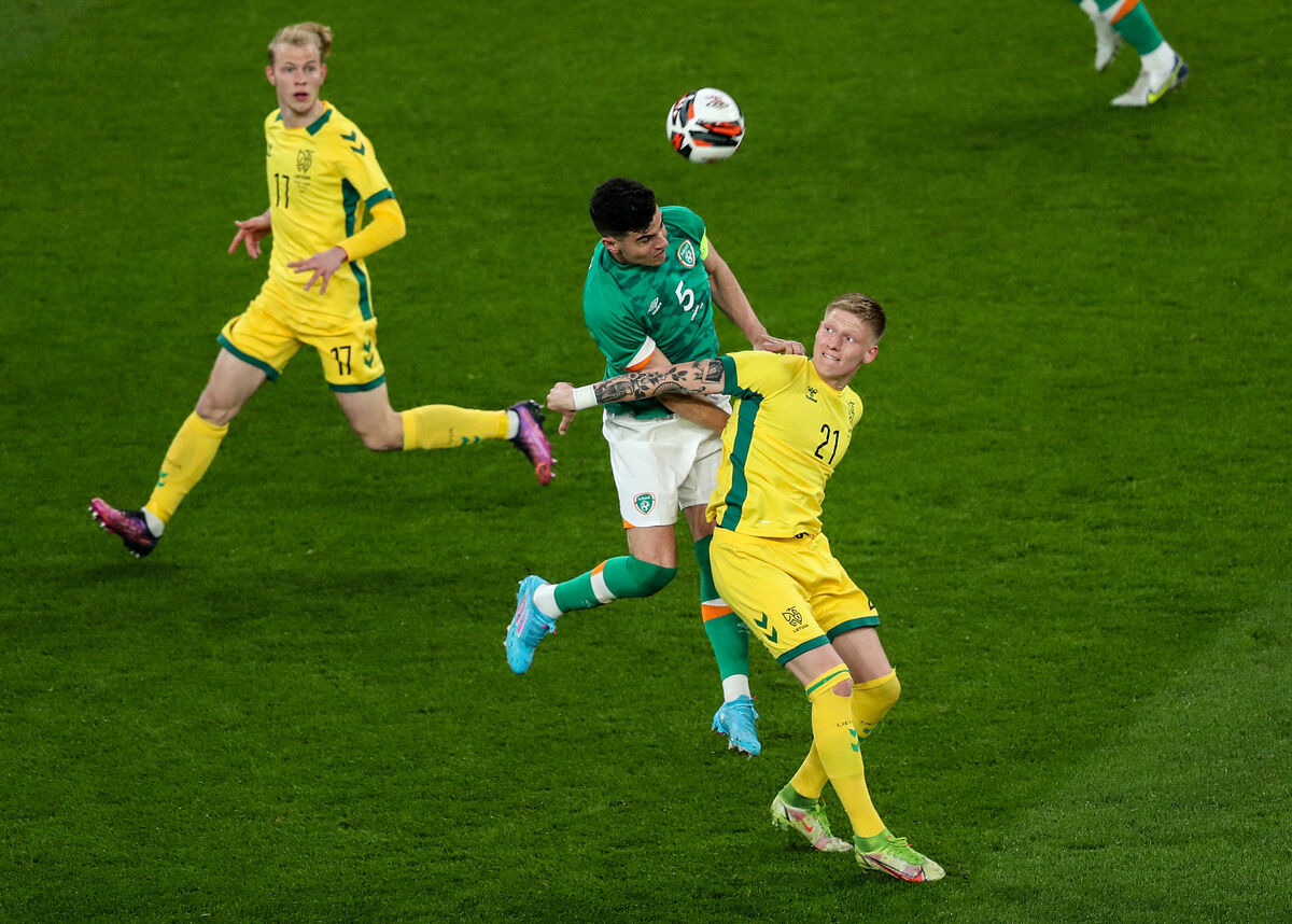 John Egan wins a header against Augustinas Klimavitius of Lithuania. Picture: INPHO/Evan Treacy