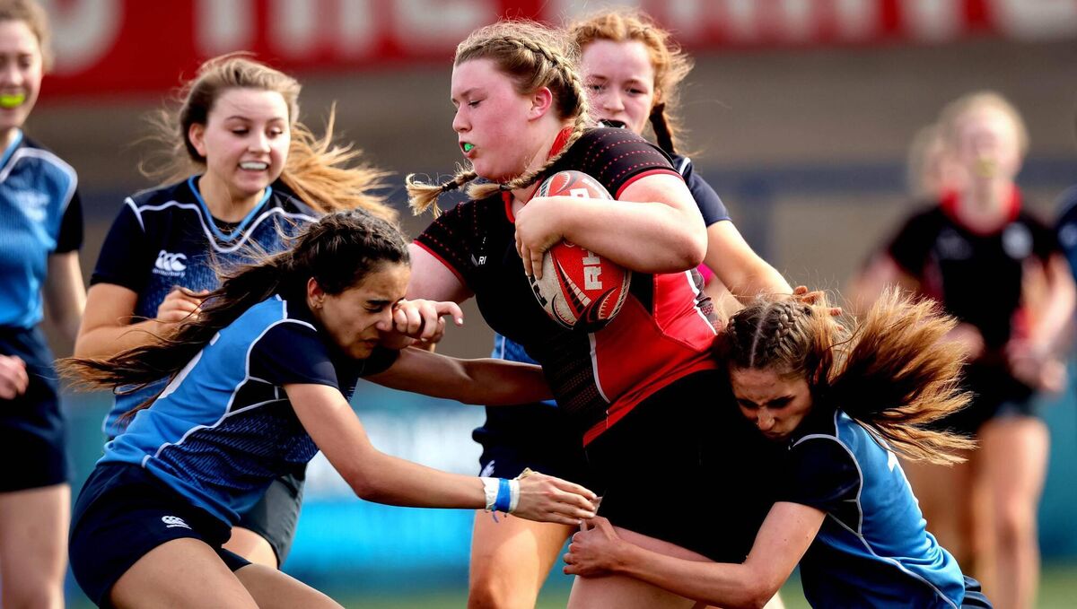 TOUGH: St. Anne's Amy Lynch with Hana Hehir and Lucia Te Pou of Ardscoil Mhuire Mandatory Credit ©INPHO/Ryan Byrne