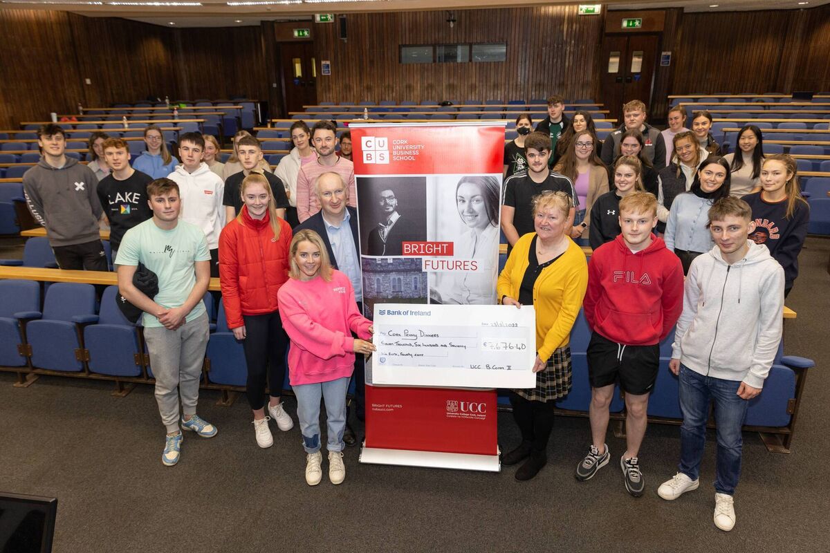 Alix Carey and her class mates presented the cheque to Caitriona Twomey, Penny Dinners' Trustees Volunteer coordinator.