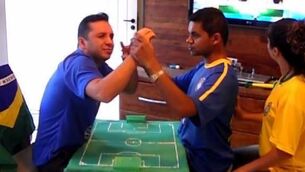 Amazing friends help deaf and blind Brazilian enjoy World Cup